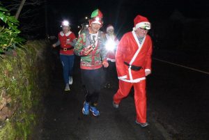 Santas make a dash through Brodick